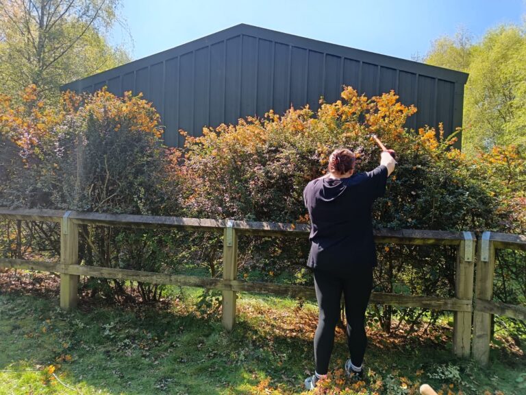 Aviva helping keep our site looking good for our guests.